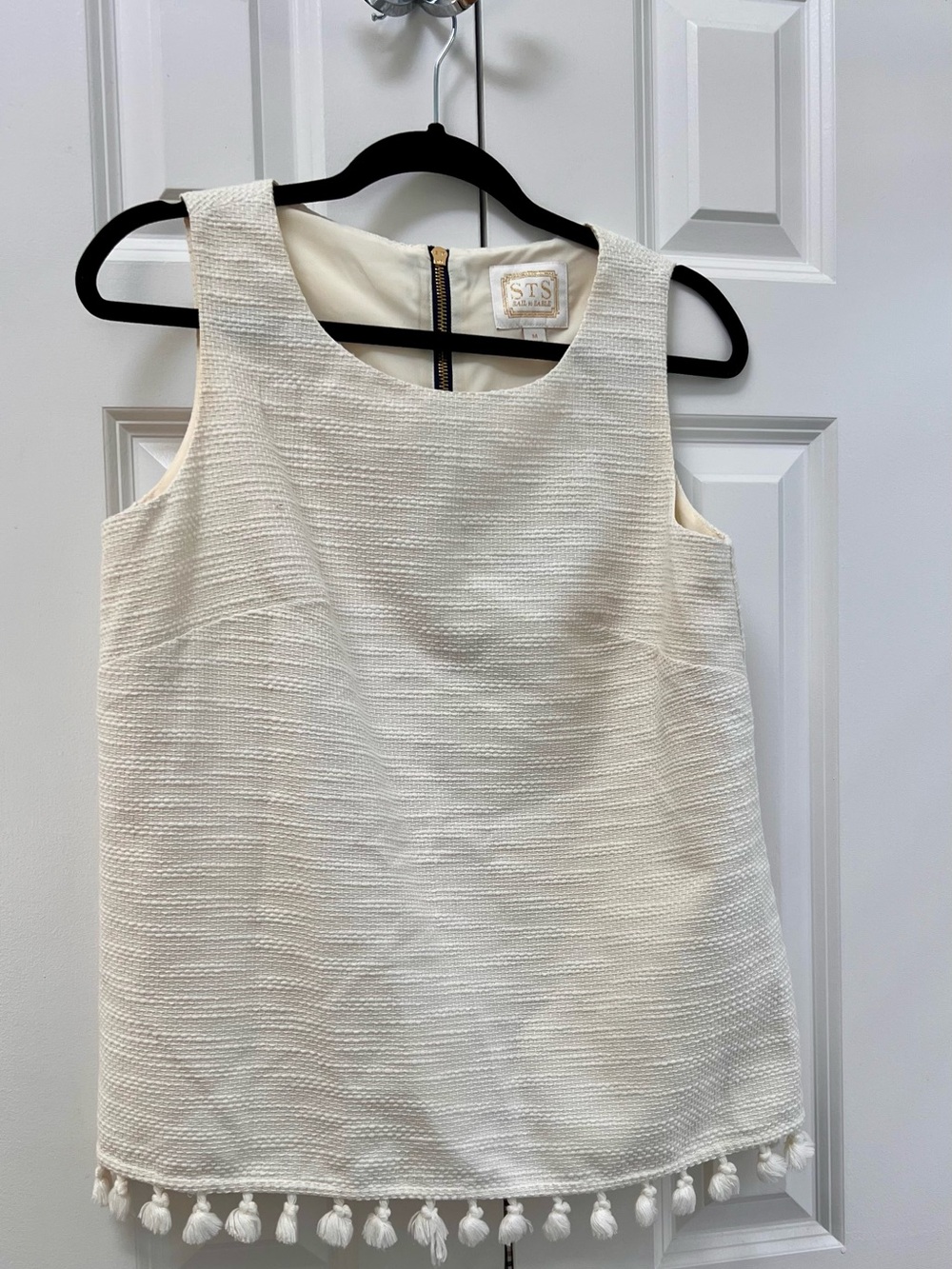 Sail to Sable Cream Textured Sleeveless Top with Tassel Hem
